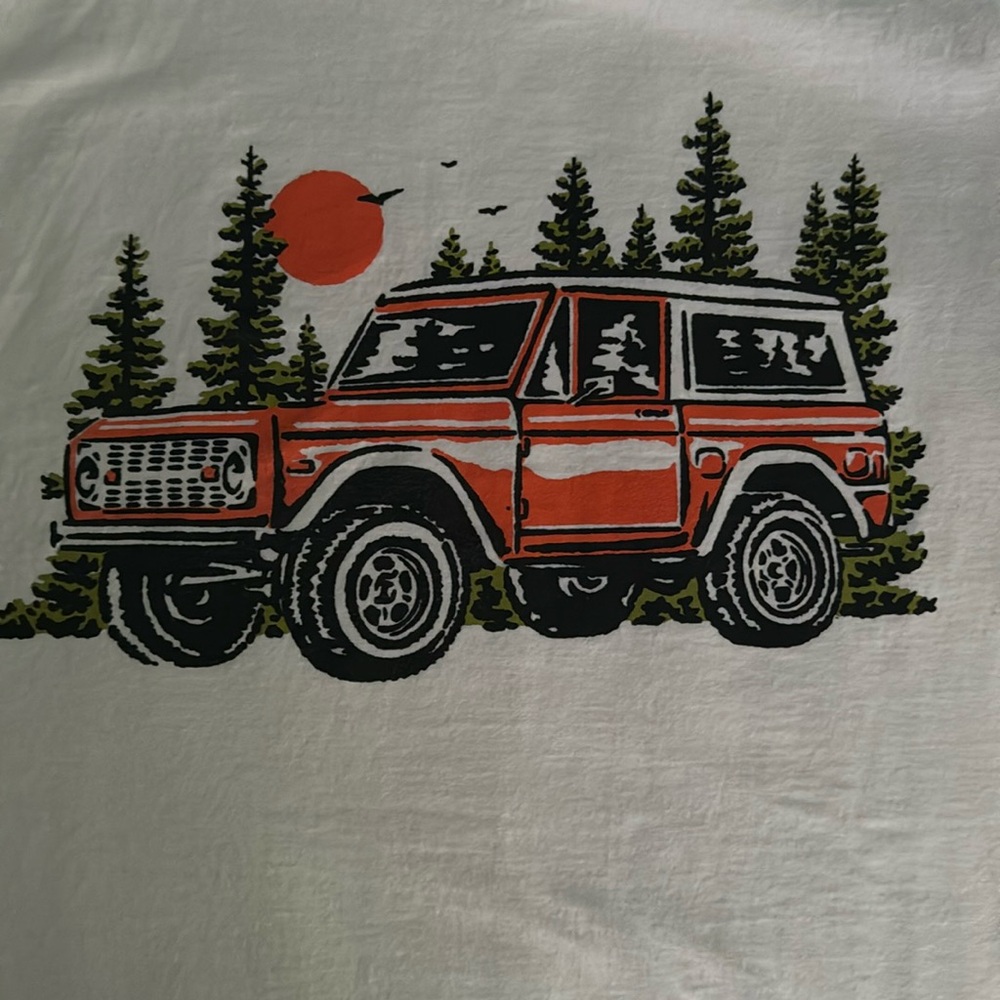 Sam Larson cream T-shirt from LootCrate